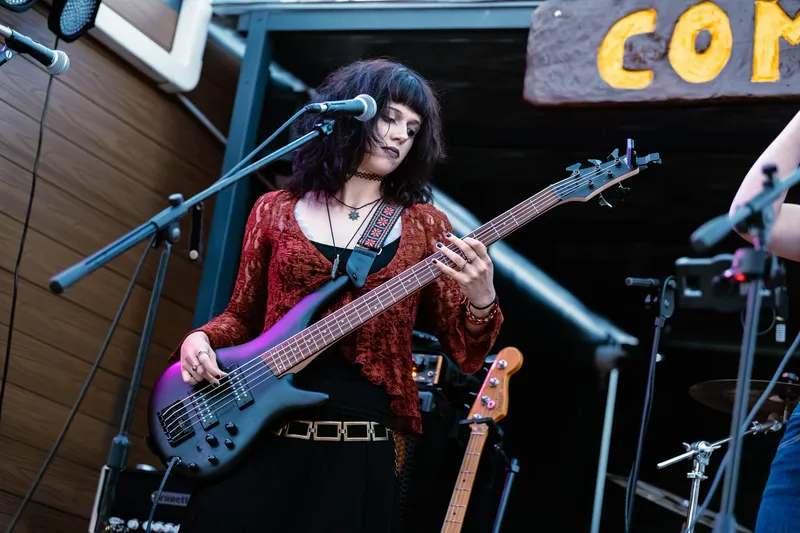 Bassist close-up, focused expression